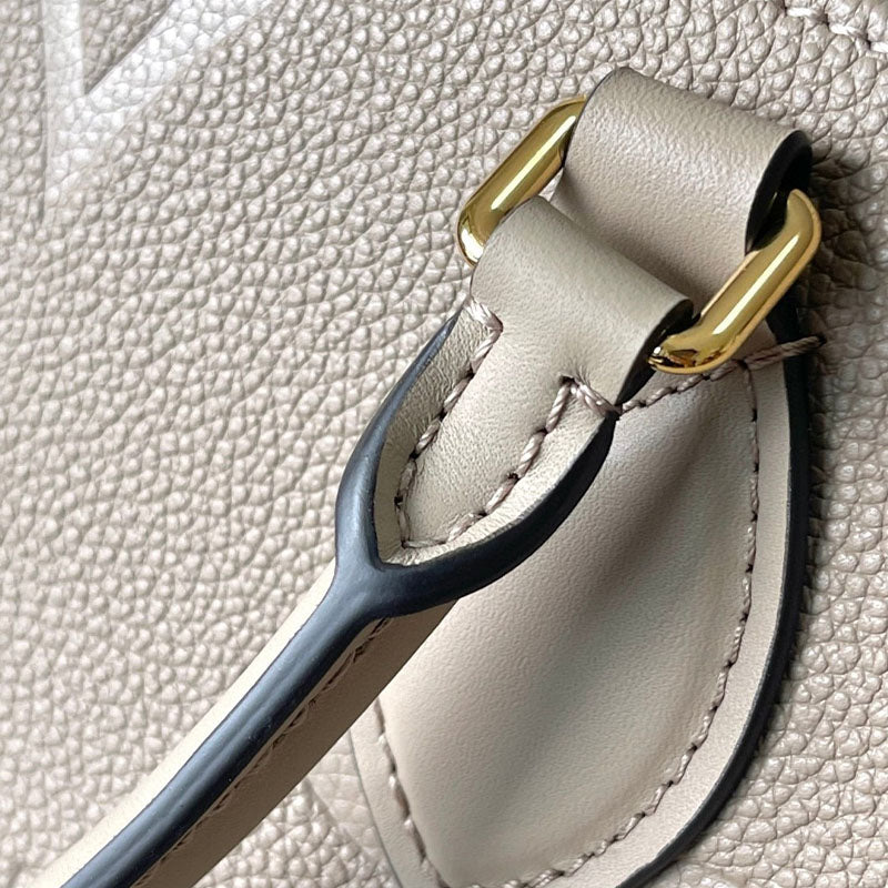 LV OnTheGo MM Monogram Empreinte Leather M45607 Bag